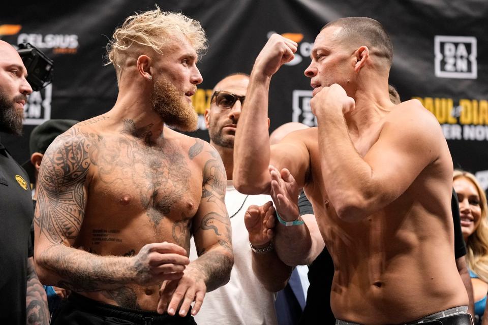 Jake Paul and Nate Diaz face off during weigh-ins before their fight at American Airlines Center.
