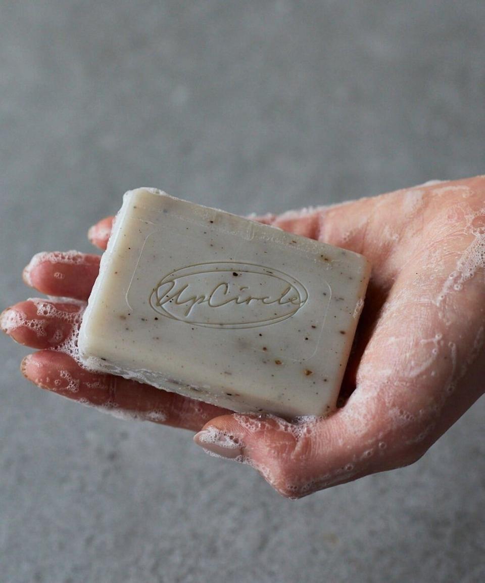 handing holding the soap bar