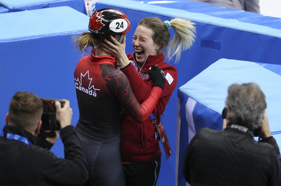 <p>Kim Boutin of Canada (with the helmet) celebrates winning the bronze medal after Choi Minjeong of South Korea is disqualified following the Ladies’ 500m Short Track Speed Skating final on day four of the PyeongChang 2018 Winter Olympic Games at Gangneung Ice Arena on February 13, 2018 in Gangneung, South Korea. (Photo by Jean Catuffe/Getty Images) </p>