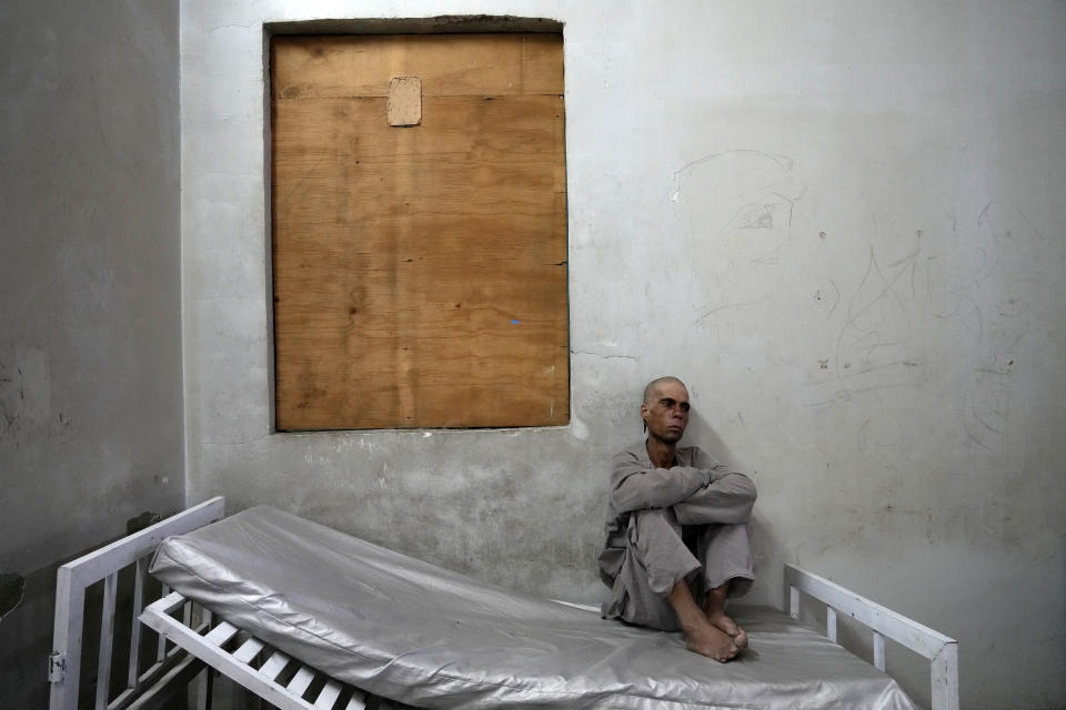 A drug addict sits on his bed in the detoxification ward of a drug treatment camp in Kabul, Afghanistan, Monday, May 30, 2022. Drug addiction has long been a problem in Afghanistan, the world’s biggest producer of opium and heroin. The ranks of the addicted have been fueled by persistent poverty and by decades of war that left few families unscarred. (AP Photo/Ebrahim Noroozi)