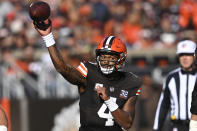 Cleveland Browns quarterback Deshaun Watson (4) passes against the Arizona Cardinals during the first half of an NFL football game Sunday, Nov. 5, 2023, in Cleveland. (AP Photo/David Richard)