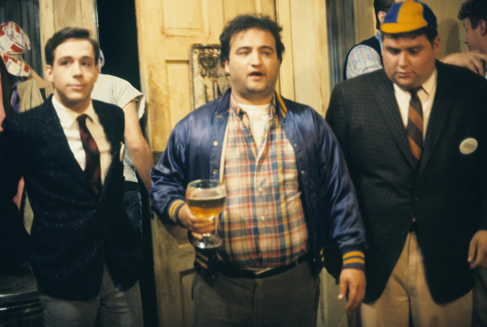 John Belushi holding a goblet of beer in Animal House