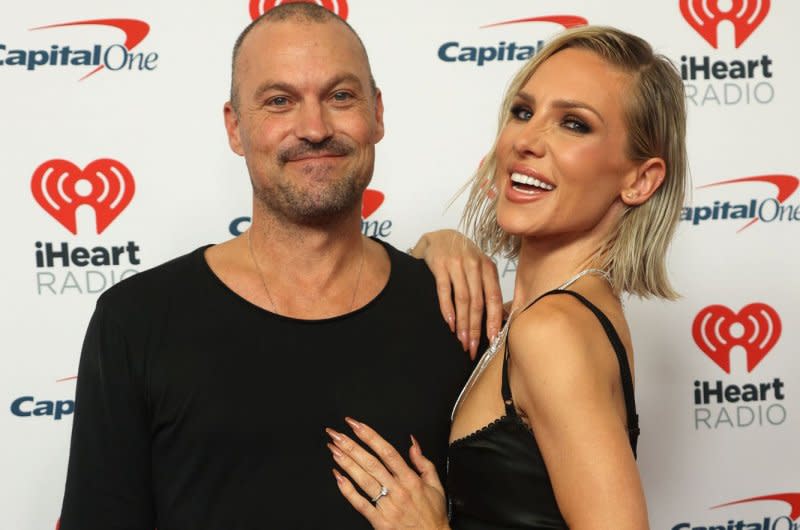 Brian Austin Green and Sharna Burgess arrive for the iHeartRadio Music Festival at T-Mobile Arena in Las Vegas on Friday. Photo by James Atoa/UPI