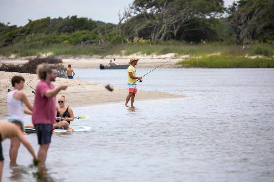 A fisherman fishes in the creek at the south end of Pawleys Island. Fishing locations along the Grand Strand. File. July 14, 2022.