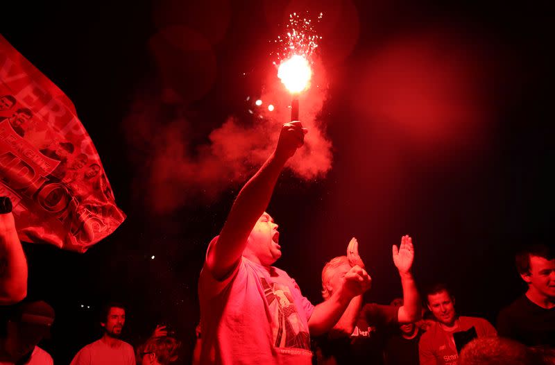 Premier League - Liverpool fans celebrate winning the Premier League