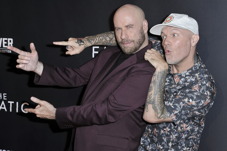 John Travolta, left, and Fred Durst attend the LA premiere of "The Fanatic" at the Egyptian Theatre on Thursday, Aug. 22, 2019, in Los Angeles. (Photo by Richard Shotwell/Invision/AP)