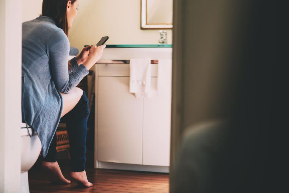 Make sure to wash your hands and phone if you take it to the loo. Photo: Getty