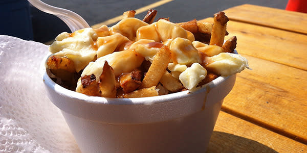 <b>Poutine, Canada</b> It may sound like a heart attack on a paper plate but this Canadian combination of thick chips, cheese curds and gravy is filling and delicious. You will find the best versions in its home, French-speaking Québec.