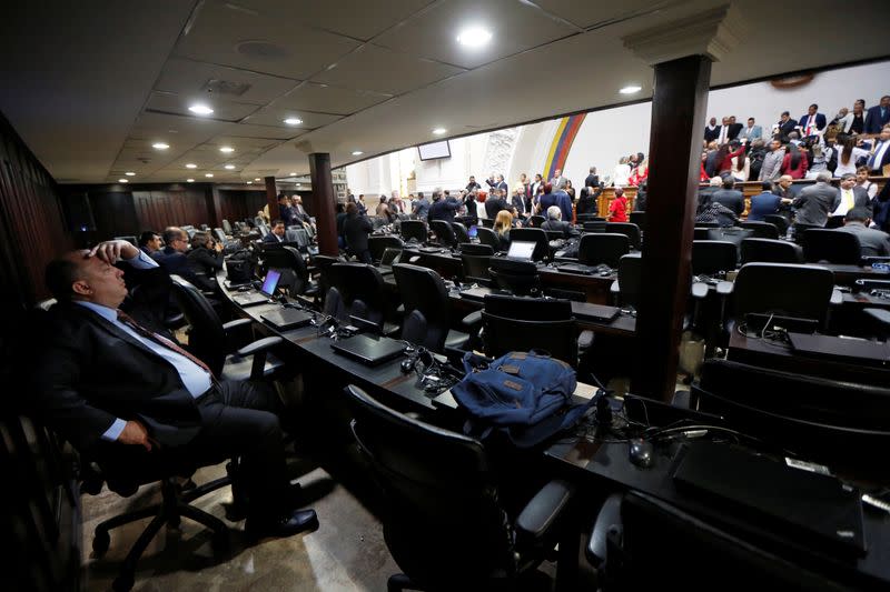 A lawmaker sits during a swearing in ceremony at Venezuela's National Assembly building in Caracas