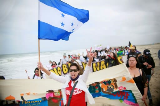 Pro-migrant caravan demonstrators stage a rally in on April 29, 2018 atthe US-Mexico Border in San Ysidro, California; the caravan is a tradition dating back to 2010 and is designed to draw attention to the plight of destitute Central Americans