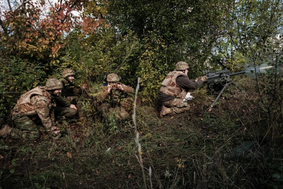 <div class="inline-image__caption"><p>A soldier of Ukraine’s 5th Regiment of Assault Infantry fires a U.S.-made MK-19 automatic grenade launcher toward Russian positions less than 800 meters away at a front line near Toretsk in the Donetsk region on Oct. 12, 2022, amid the Russian invasion of Ukraine.</p></div> <div class="inline-image__credit">Yasuyoshi Chiba/AFP via Getty</div>