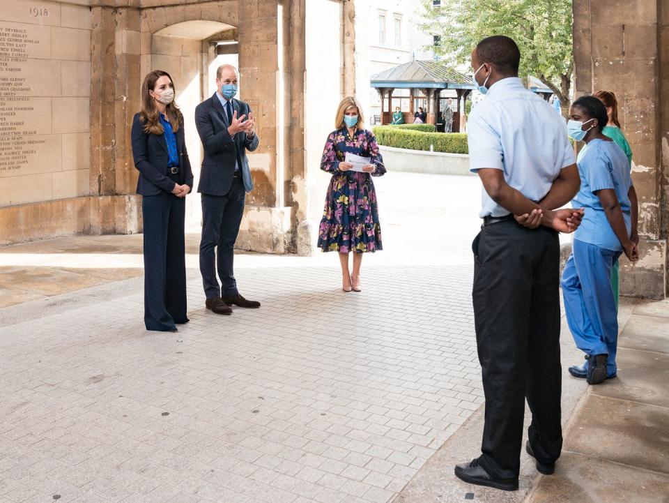 <p>The Duke and Duchess of Cambridge sported matching suits while presenting a Pride of Britain award to NHS frontline workers. The ceremony occurred at London's St Bartholomew's, Britain's oldest free hospital. Of course, the duo paired their pantsuits with protective masks. </p>