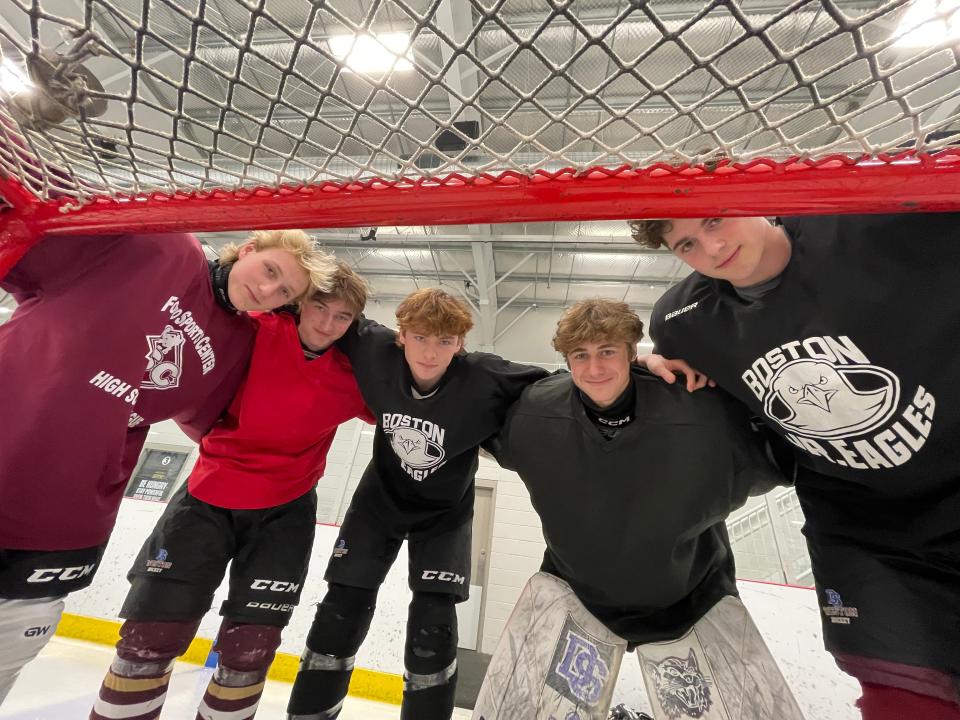 From left, Dover-Sherborn/Weston captains Andrew Marden, Sam Hinckley, Calvin Roman, Andrew Goldstein and Sawyer Garzone pose before practice at Boston Sports Institute in Wellesley on March 14, 2024.