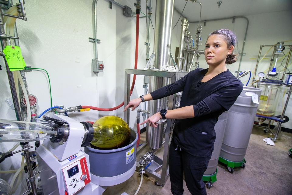 Lab manager Charlotte Pizzuto, of Whitehouse Station, talks about the process of ethanol extraction to create cannabis oil, used for vapes and edibles, at the Verano cannabis cultivation center in Readington on Thursday, Jan. 5, 2023. Verano owns the Zen Leaf dispensaries in Elizabeth, Lawrence and Neptune.