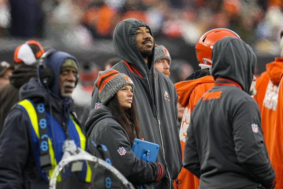 Cleveland Browns defensive end Myles Garrett (95) watches from the sideline during the first half of an NFL football game against the Cincinnati Bengals in Cincinnati, Sunday, Jan. 7, 2024. (AP Photo/Sue Ogrocki)