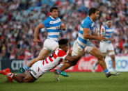 Rugby Union - Rugby Test - Japan v Argentina - Prince Chichibu Memorial Stadium, Tokyo, Japan - 05/11/16 Argentina's Ramiro Moyano (R) and Japan's Kotaro Matsuhima in action. REUTERS/Kim Kyung-Hoon