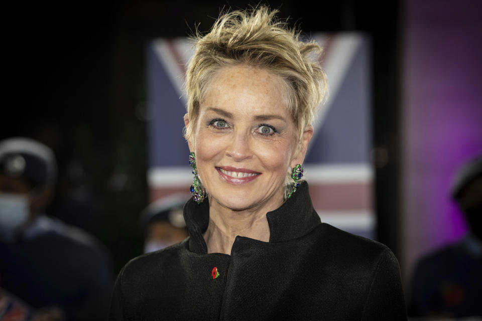 FILE - Sharon Stone poses for photographers upon arrival at the Pride of Britain Awards on Saturday, Oct. 30, 2021, in London. Stone turns 65 on March 10. (Photo by Vianney Le Caer/Invision/AP, File)