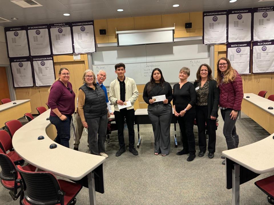 Two students from Shadow Hills High School's speech and debate team emerged as the top winners at the Rotary Club of Indio's Four-Way Test Speech contest. From left to right: Khristina Clous, Sue Steding, Dennis Sheehan, Alex Zuniga, Savannah Vela, Cathy Niederkorn, Elizabeth Tucker and Monika Ujkic.