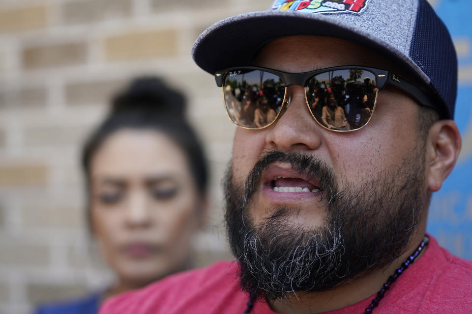 Alfred Garza III, father of school shooting victim Amerie Jo Garza, talks with the media following a special emergency city council meeting to reissue the mayor's declaration of local state of disaster due to the recent school shooting at Robb Elementary School, Tuesday, June 7, 2022, in Uvalde, Texas. Two teachers and 19 students were killed. (AP Photo/Eric Gay)