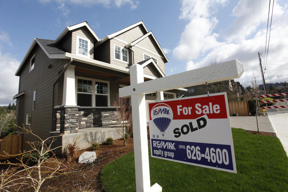 Homes are seen for sale in the northwest area of Portland, Oregon March 20, 2014. Would-be buyers risk being crowded out by the run-up in home prices and mortgage rates over the past year. Home values nationwide were up 12 percent in January from the same month last year, according to data firm CoreLogic, while mortgage rates have jumped about a full percentage point.   REUTERS/Steve Dipaola  (UNITED STATES - Tags: REAL ESTATE BUSINESS)