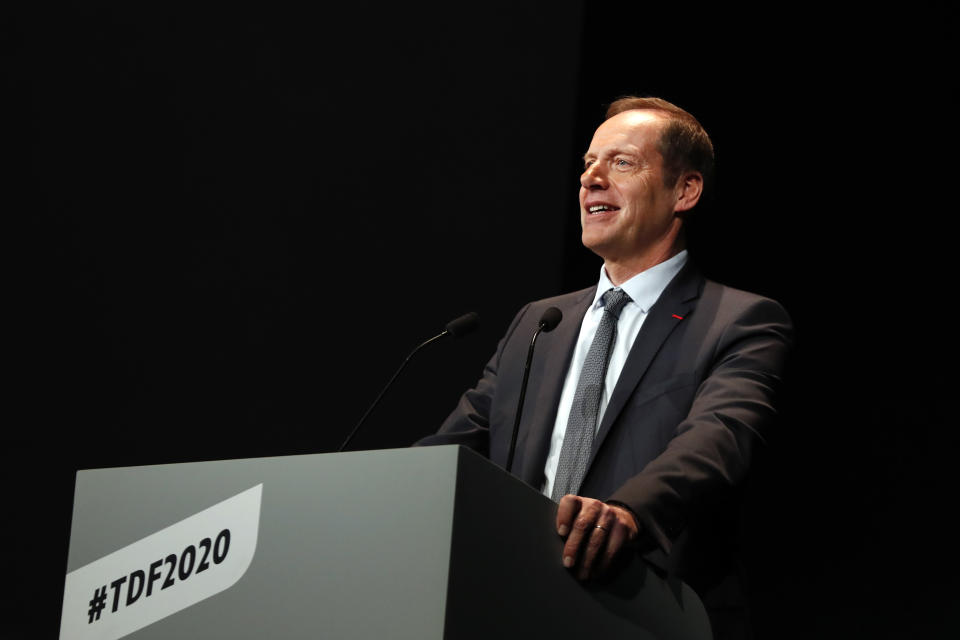 Tour de France director Christian Prudhomme delivers a speech during the presentation of the Tour de France 2020 cycling race, in Paris, Tuesday Oct. 15, 2019. The 107th edition of the race starts on June 27 2019 to end on the Champs-Elysees avenue on July 19. (AP Photo/Thibault Camus)