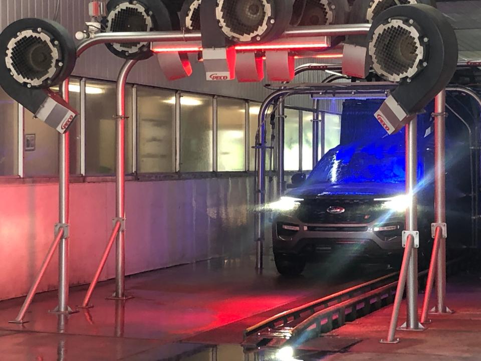 A crossover goes through the car wash at Dad's Car Care Center on Whipple Avenue NW in Jackson Township