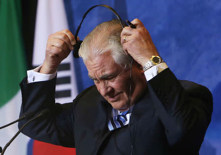 FILE PHOTO: U.S. Secretary of State Rex Tillerson removes his headphones used for translation during a news conference during the Foreign Ministers’ Meeting on Security and Stability on the Korean Peninsula in Vancouver, British Columbia, Canada, January 16, 2018. REUTERS/Ben Nelms