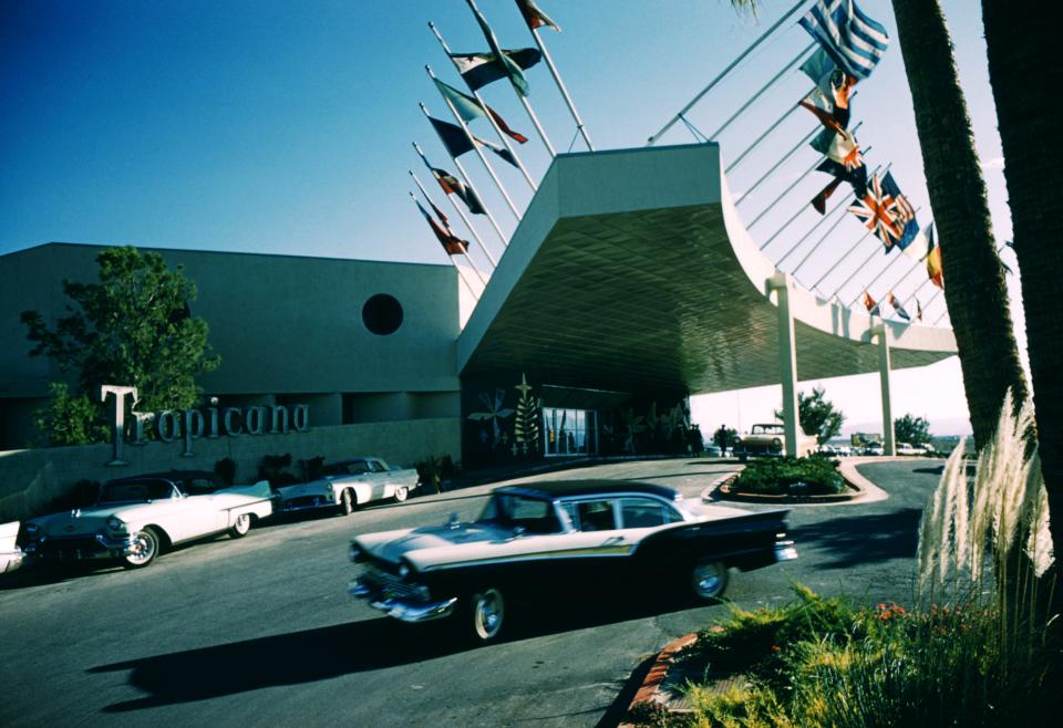 facade of the Tropicana with 50s cars in front