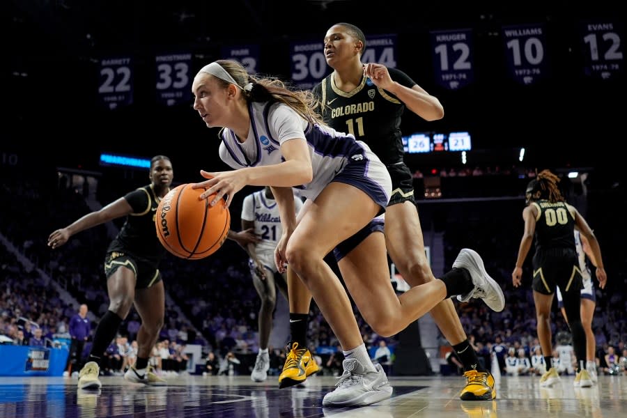 Kansas State guard Serena Sundell, front, drives past Colorado forward Quay Miller (11) during the first half of a second-round college basketball game in the women’s NCAA Tournament in Manhattan, Kan., Sunday, March 24, 2024, in Manhattan, Kan. (AP Photo/Charlie Riedel)