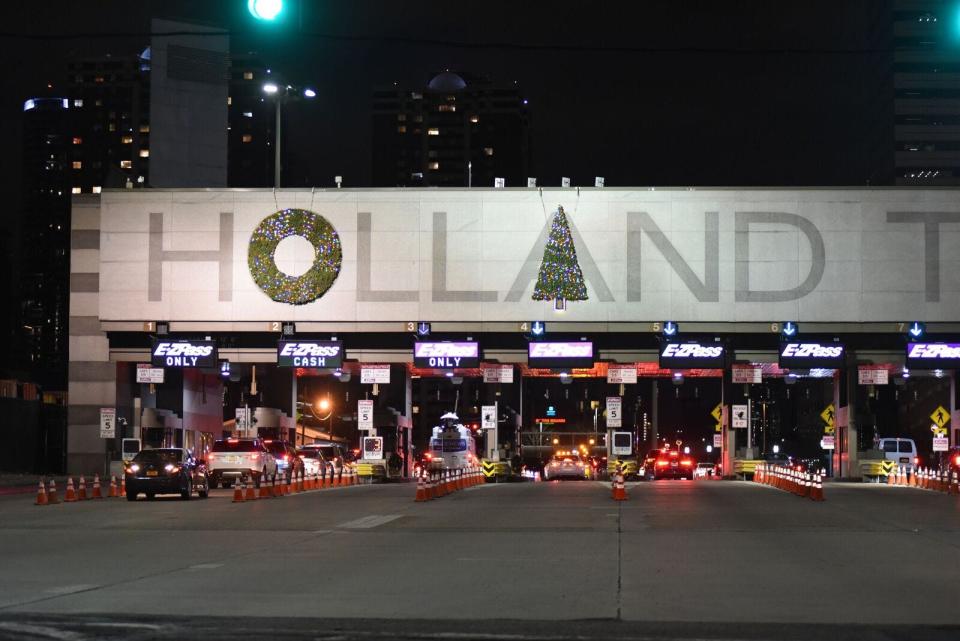 The wreaths at the New York City-bound entrance of the Holland Tunnel in Jersey City were moved.