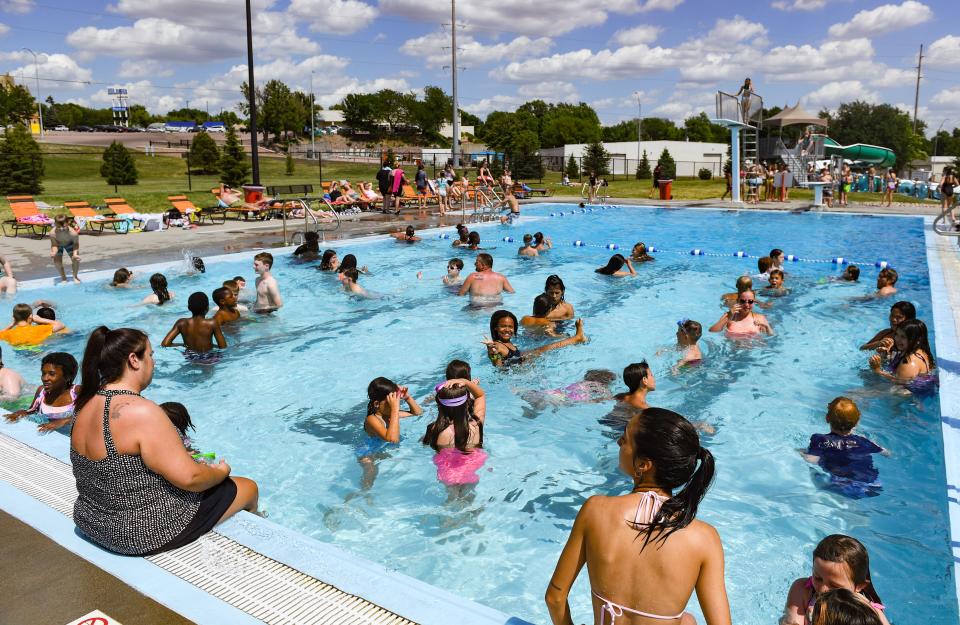 Kids cool off in the water on Wednesday, June 9, 2021, at the Drake Springs Family Aquatic Center in Sioux Falls. 