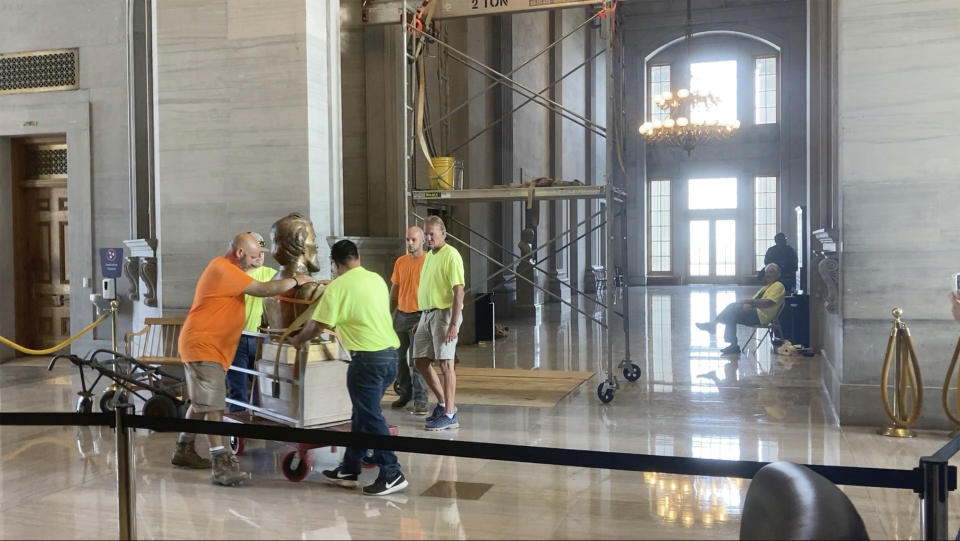 The Nathan Bedford Forrest bust is removed from inside of the Tennessee Capitol on Friday, July 23, 2021 in Nashville. Tennessee’s State Building Commission voted 5-2 to remove the bust of the Confederate general and early Ku Klux Klan leader on Thursday, the final hurdle in a months-long process. (AP Photo/Kimberlee Kruesi)