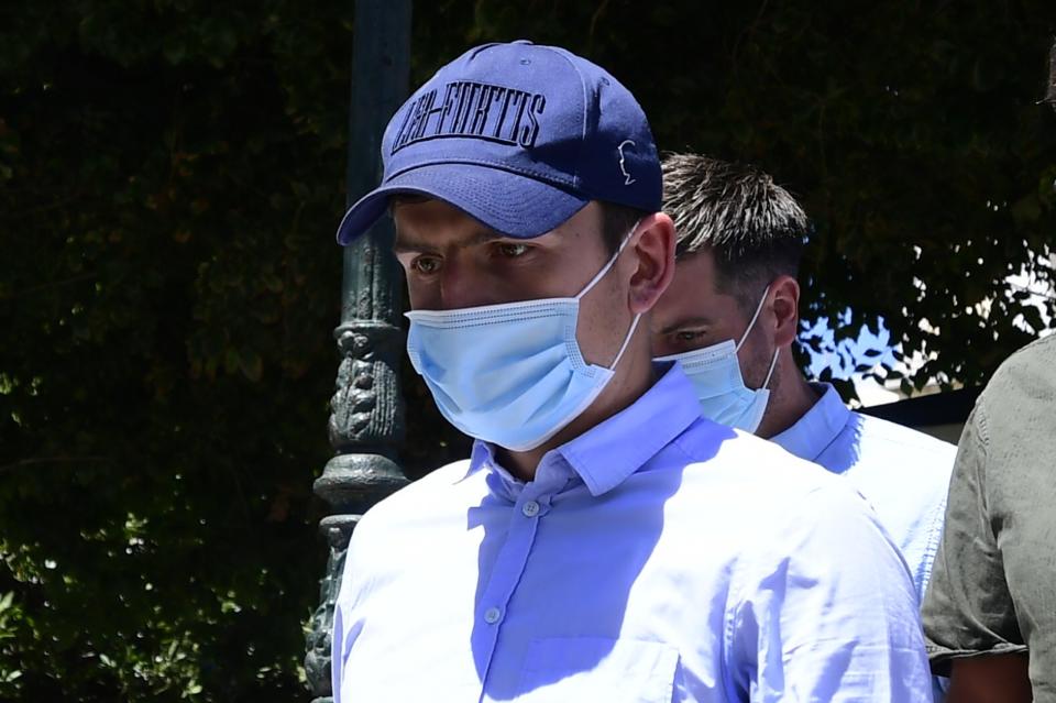 England soccer player Harry Maguire leaves a court building on the Aegean island of Syros, Greece, on Saturday, Aug. 22, 2020. The Manchester United captain was arrested during a brawl on the neighbouring holiday island of Mykonos. (AP Photo/Michael Varaklas)