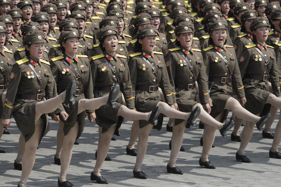 FILE - In this April 15, 2017, file photo, women soldiers march across Kim Il Sung Square during a military parade in Pyongyang, North Korea, to celebrate the 105th birth anniversary of Kim Il Sung, the country's late founder and grandfather of current ruler Kim Jong Un. A massive military parade is expected on Sunday, Sept. 9, 2018, to mark the 70th anniversary of the founding of North Korea’s socialist government, Goose-stepping soldiers are the most spectacular part of North Korea’s massive military parades. (AP Photo/Wong Maye-E. File)