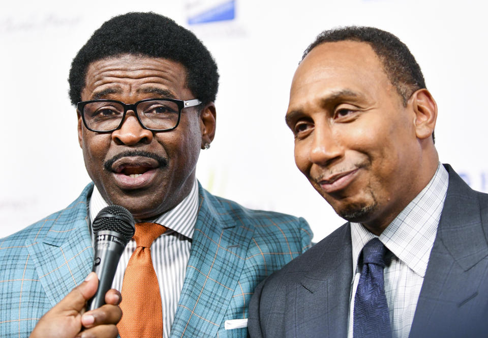 Michael Irvin and Stephen A. Smith banter at the Harold and Carole Pump Foundation Gala at The Beverly Hilton on August 20, 2021 in Beverly Hills, California. (Photo by Rodin Eckenroth/Getty Images)