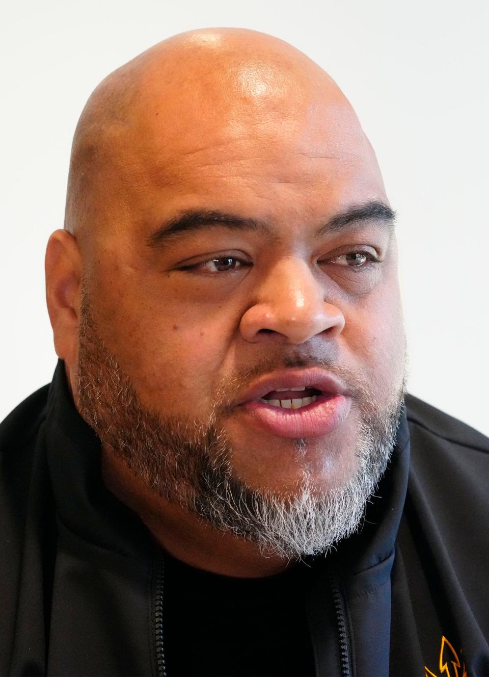 Arizona State offensive line coach Saga Tuitele talks to the media at the Carson Student-Athlete Center in Tempe on Feb. 2, 2023.