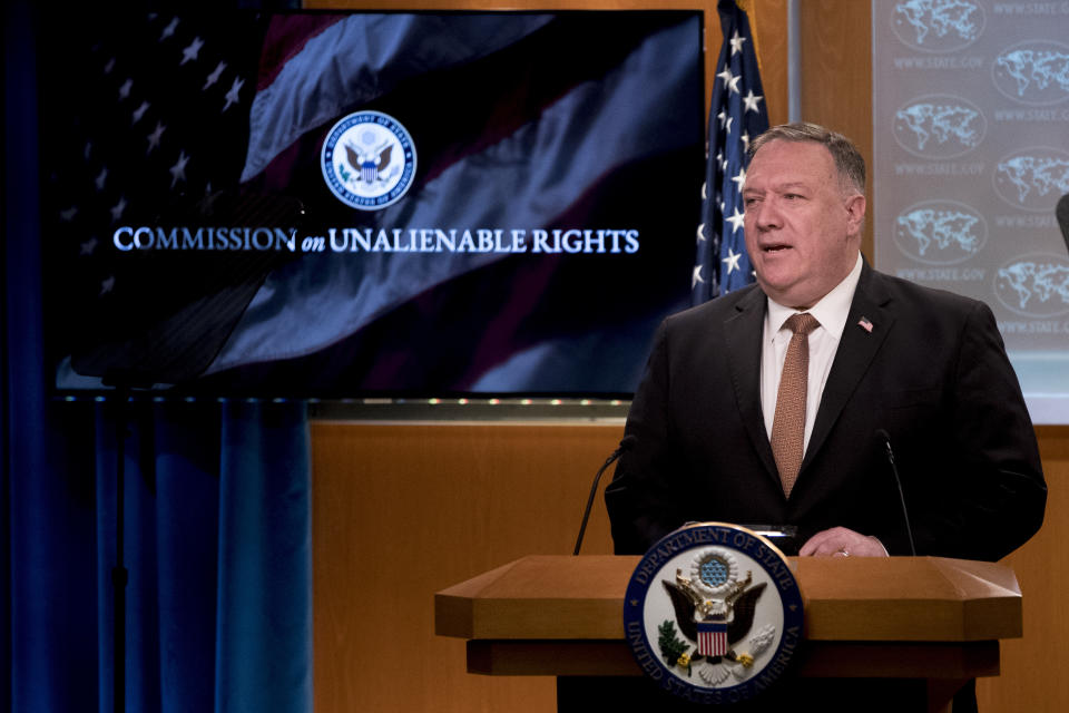 A monitor displays the words "Commission on Unalienable Rights" behind Secretary of State Mike Pompeo as he speaks during a news conference at the State Department in Washington, Wednesday, July 15, 2020. (AP Photo/Andrew Harnik, Pool)