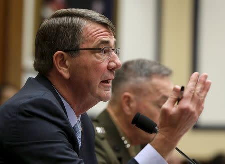 U.S. Defense Secretary Ash Carter (L) and Joint Chiefs Chairman Marine Corps Gen. Joseph Dunford Jr., testify before a House Armed Services Committee hearing on "U.S. Strategy for Syria and Iraq and its Implications for the Region.", in Washington December 1, 2015. REUTERS/Gary Cameron