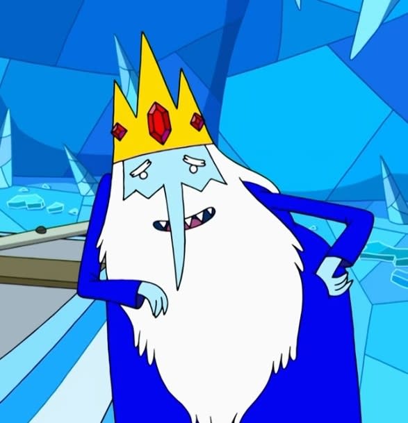 Ice King leaning on a counter trying to flirt