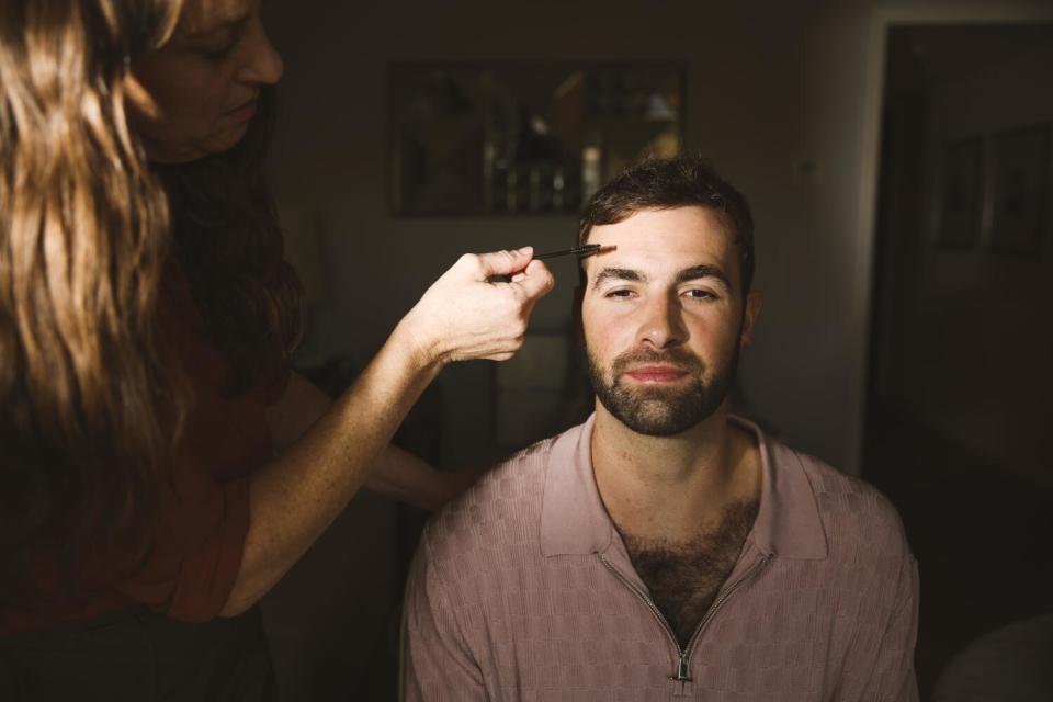 Ronald Gladden being groomed before the Emmys