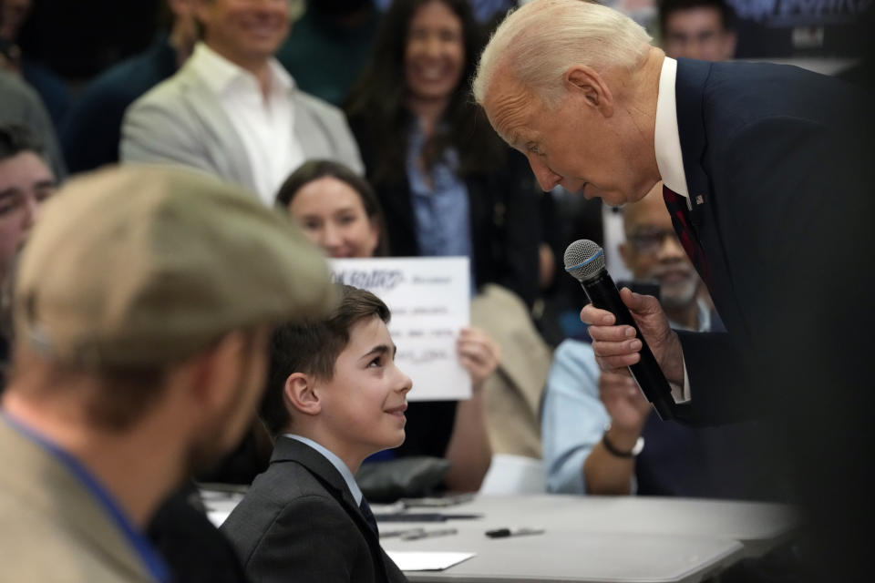 President Joe Biden talks to Harry Abramson as he visits his Wisconsin election campaign office Wednesday, March 13, 2024, in Milwaukee. (AP Photo/Jacquelyn Martin)