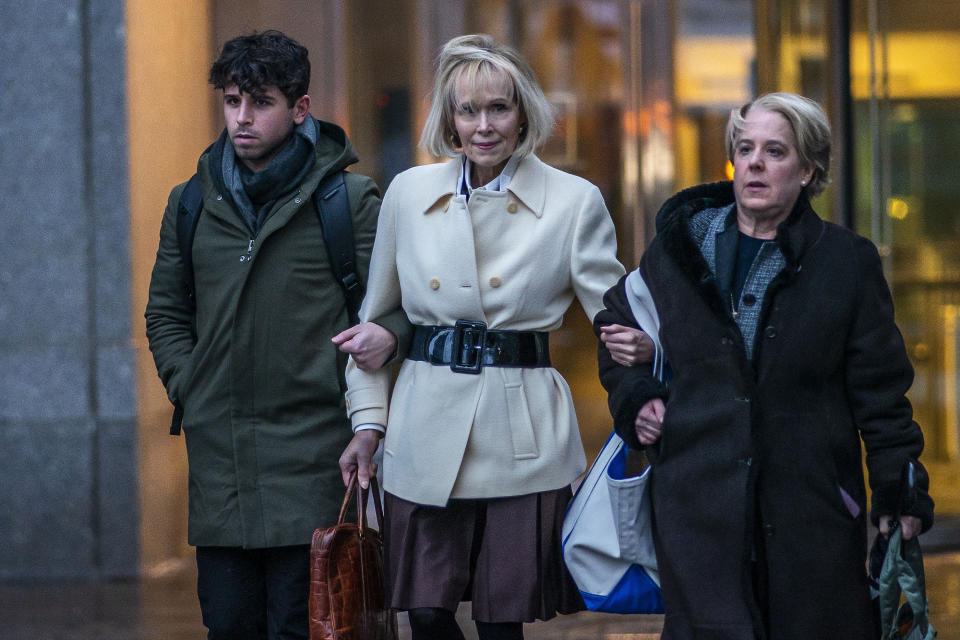 E. Jean Carroll, center, exits, with her attorney Roberta Kaplan, right, at federal court, in New York, Tuesday, Jan. 16, 2024. (AP Photo/Eduardo Munoz Alvarez)