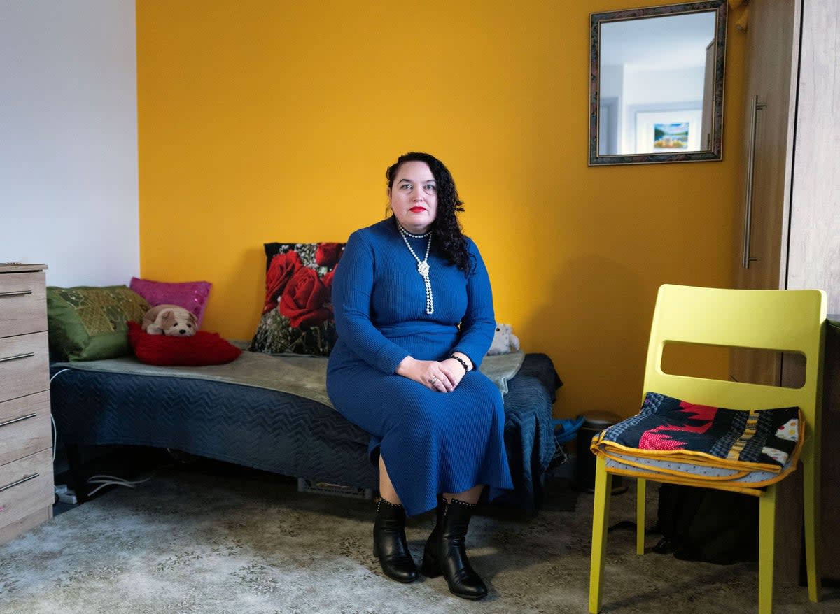 Ukrainian refugee Liudmyla (Mila) Panchenko poses for a photo in a room at her current residence in Hatfield (REUTERS/Anna Gordon) (REUTERS)