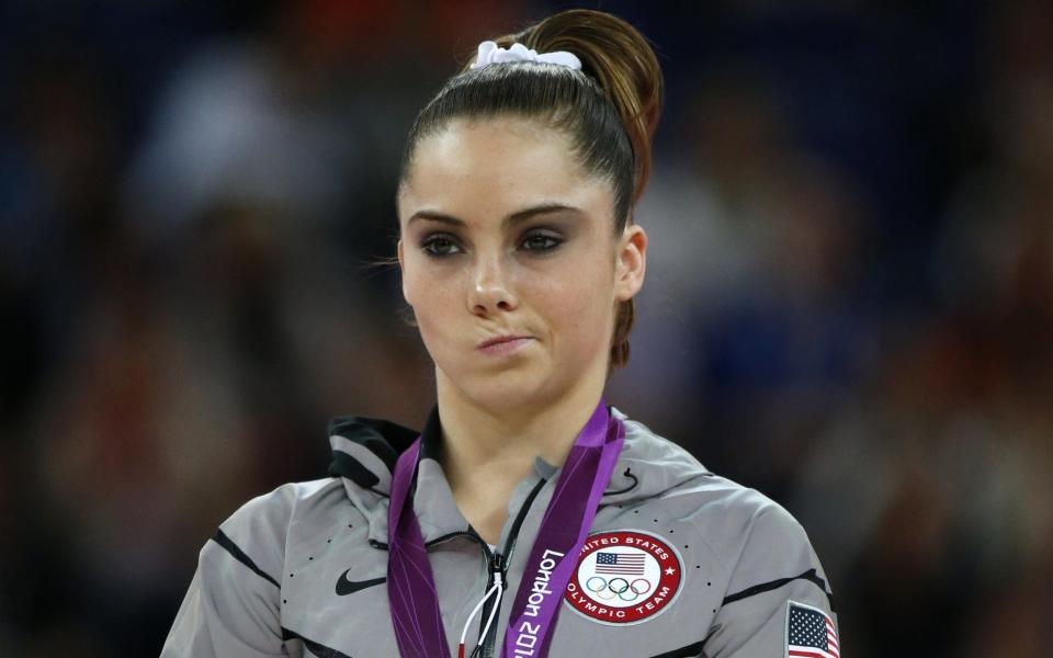 US McKayla Maroney poses with her silver medal on the podium of the women's vault final of the artistic gymnastics event of the London Olympic Games on August 5, 2012 - AFP