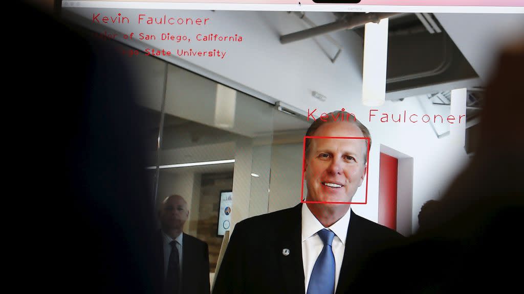 San Diego Mayor Kevin Faulconer is identified by facial recognition as he attends the opening of a new data lab by information services company Experian in San Diego, California April 12, 2016. REUTERS/Mike Blake