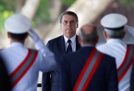 Brazil's President Jair Bolsonaro attends a swearing-in ceremony for the country's new Navy commander in Brasilia, Brazil January 9, 2019. REUTERS/Adriano Machado