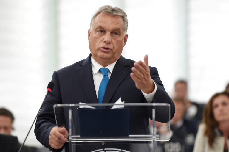 Hungarian Prime Minister Viktor Orban vowed Tuesday he would resist and attempt to "blackmail" it into softening its anti-migrant stance