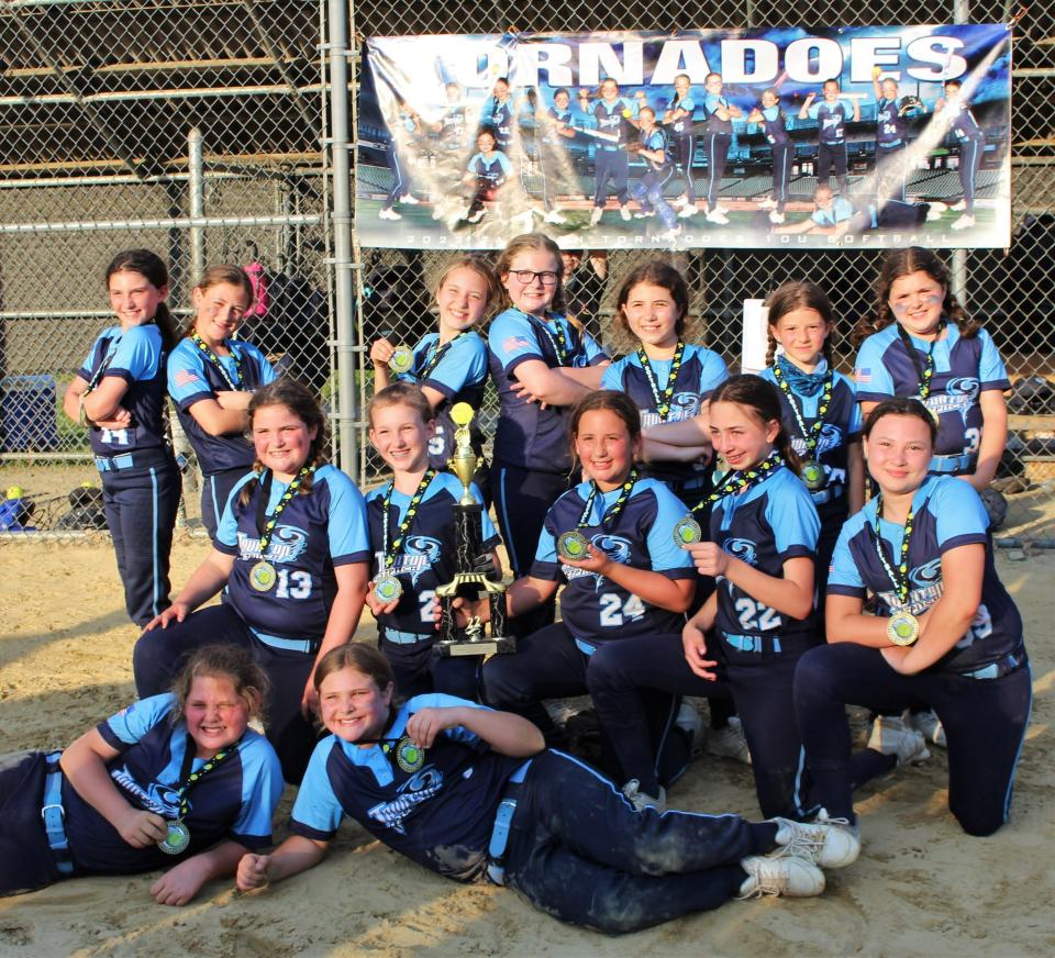 Members of the Taunton Tornados 10U softball team with their trophy and medals from winning The Jaxon Marocco Classic in Cranston, R.I.