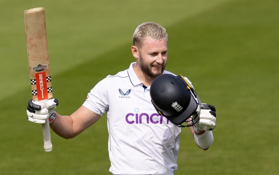 Gus Atkinson of England celebrates reaching his century