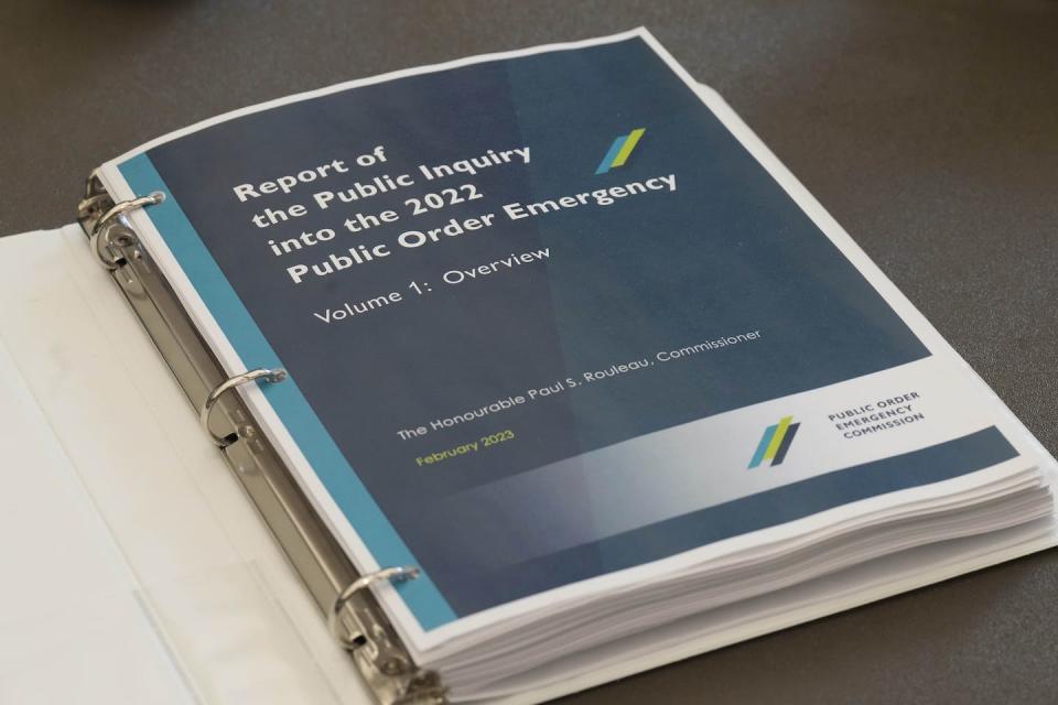 A copy of Justice Paul Rouleau’s report on the Liberal government’s use of the Emergencies Act is shown in Ottawa on Feb. 17, 2023. THE CANADIAN PRESS/Adrian Wyld